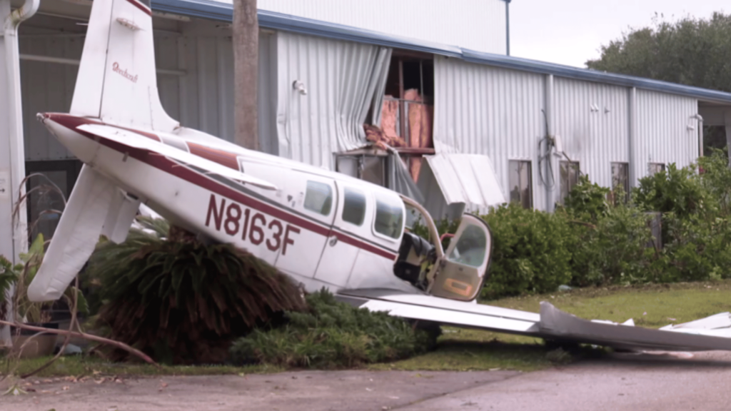 A Beech A36, registration N8163F, crashed into a hangar in Naples, FL.