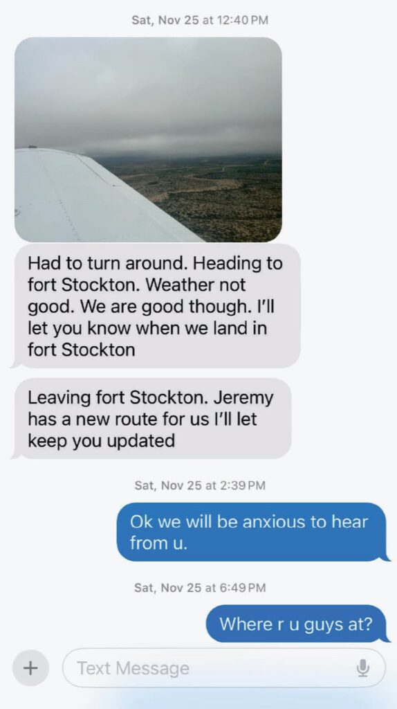 Screenshot of a text message conversation dated Saturday, November 25. The first message, sent at 12:40 PM, includes a photo taken from inside a small aircraft, showing the wing and a cloudy sky. The message reads: “Had to turn around. Heading to fort Stockton. Weather not good. We are good though. I’ll let you know when we land in fort Stockton.” A follow-up message reads: “Leaving fort Stockton. Jeremy has a new route for us I’ll let keep you updated.” At 2:39 PM, a reply reads: “Ok we will be anxious to hear from u.” At 6:49 PM, another message asks: “Where r u guys at?”