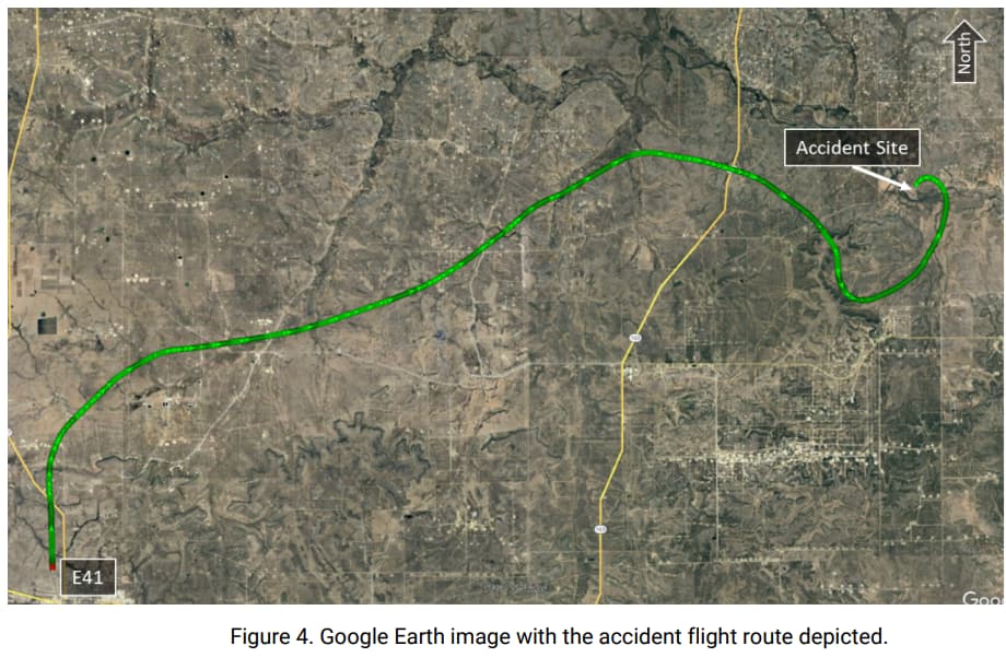 Google Earth satellite image showing the ADS-B flight route of an aircraft from Winkler County Airport (E41) to the location of an accident. The green line represents the aircraft’s flight path, which heads east and then curves northward, ending at a marked "Accident Site" on the map. A north arrow is present in the upper-right corner, and major roads are visible in the background.