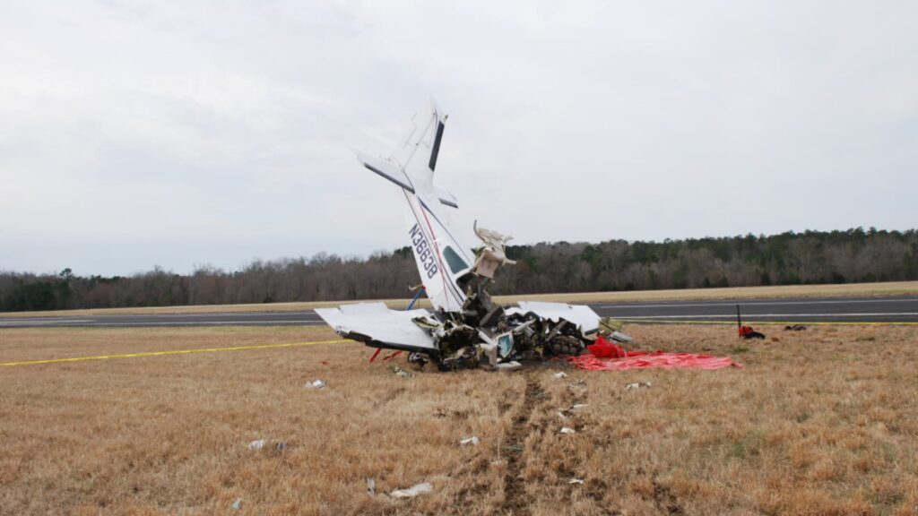 Wreckage of Beechcraft 95-B55 Baron N36638 standing nearly vertical after crashing near the runway at LaGrange-Callaway Airport in Georgia.