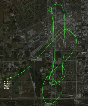 Airport ground track diagram showing a small aircraft’s looping flight path around Houston Hobby Airport before the accident.